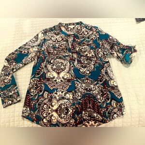 Beautifully patterned blouse.